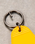 The Real McCoy's Motel Key Ring Yellow