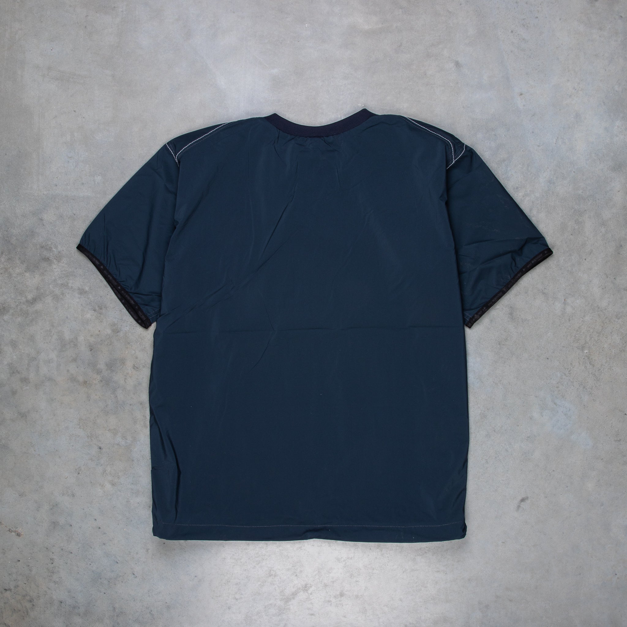 And Wander Pertex Wind T Navy – Frans Boone Store