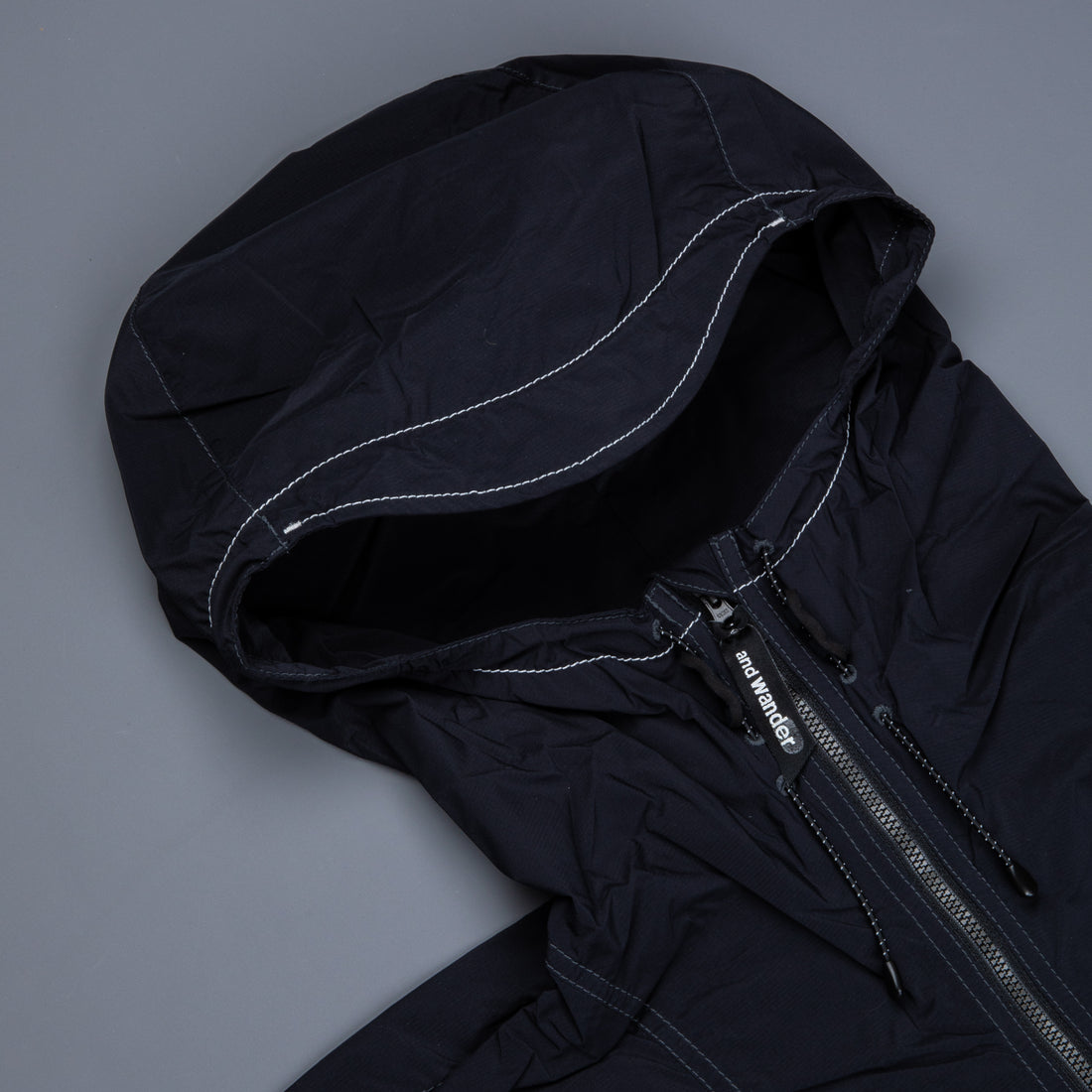 And Wander Pertex wind jacket black – Frans Boone Store