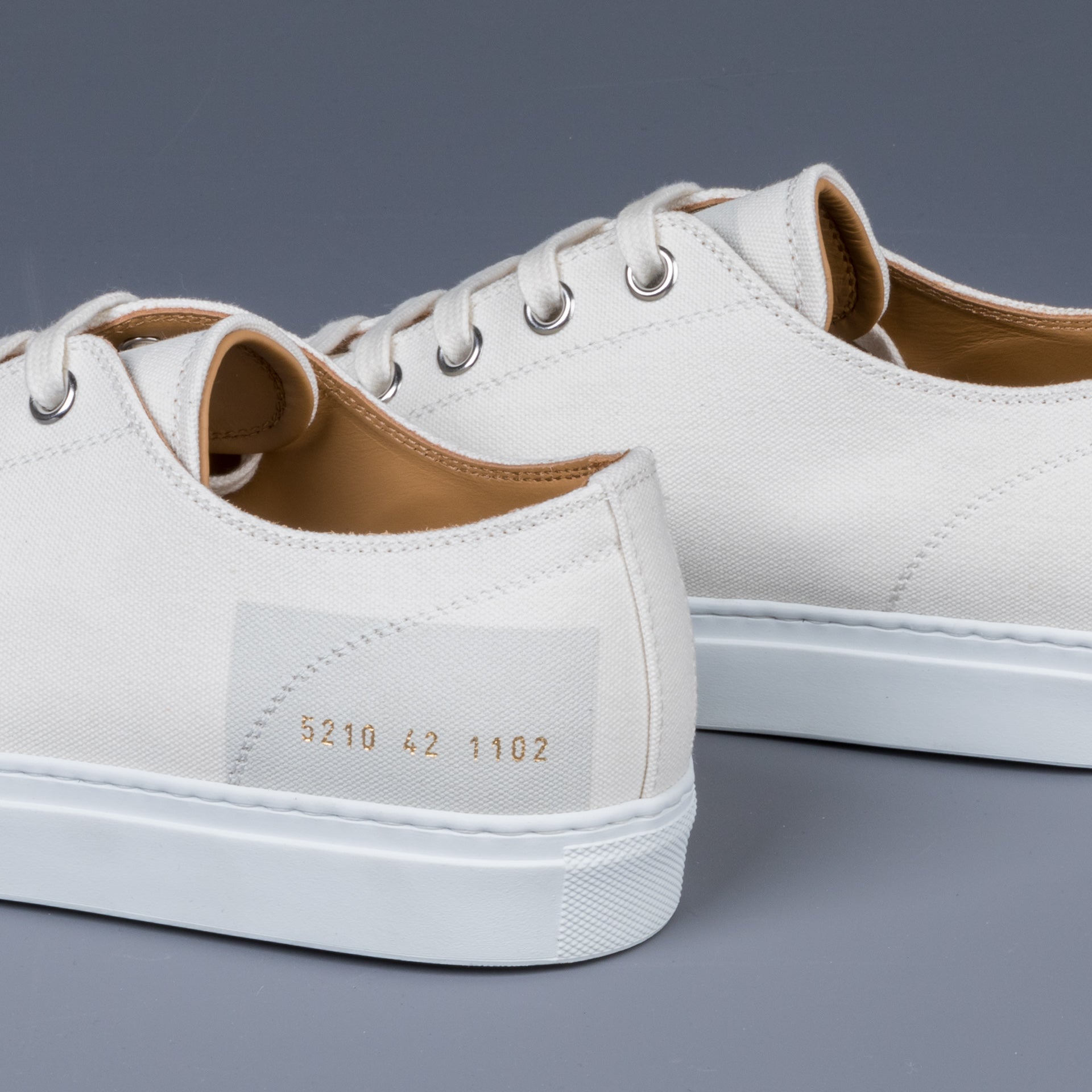 Common projects discount off white canvas